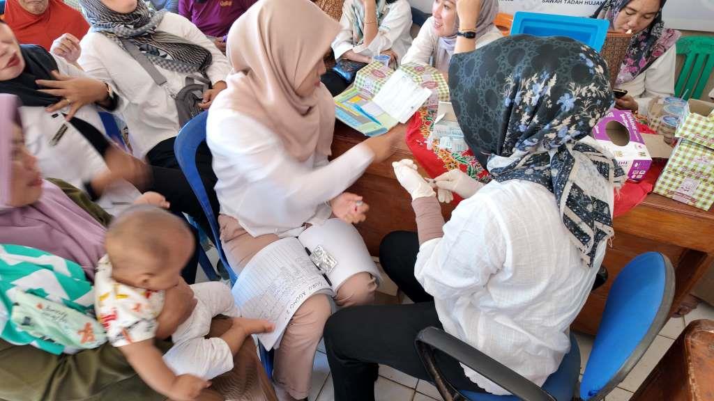 Satgas TMMD Ke-124 Kodim 0408/BS Gelar Sosialisasi dan Penyuluhan Posyandu Dan Posbindu (PTM)