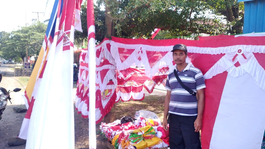 Bisnis  Bendera Merah Putih Menguntungkan